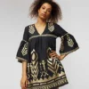 greek-archaic-kori-embroidered-boho-mini-dress-charcoal-gold (2) Greek Archaic Kori Embroidered Boho Mini Dress worn by a model Charcoal/Gold