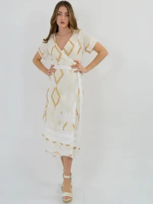 Greek Archaic Kori Wrap midi Embroidered Cotton Dress Sand White Gold warn by model