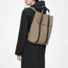 rains-2-way-backpack-beige (6) Rains 2 Way Tote Backpack beige worn by model