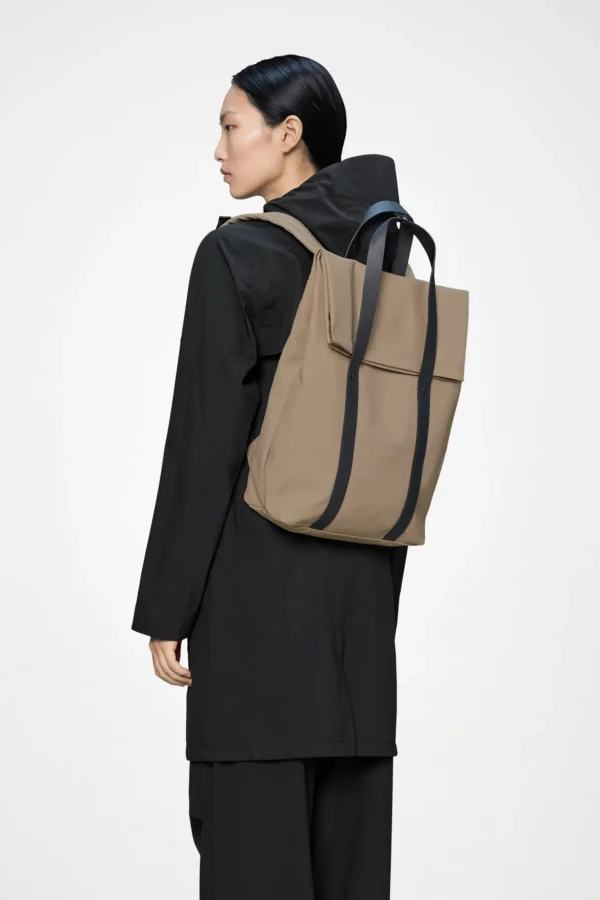 rains-2-way-backpack-beige (6) Rains 2 Way Tote Backpack beige worn by model
