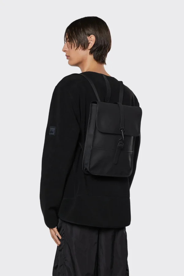 Rains Backpack Micro Black worn by model