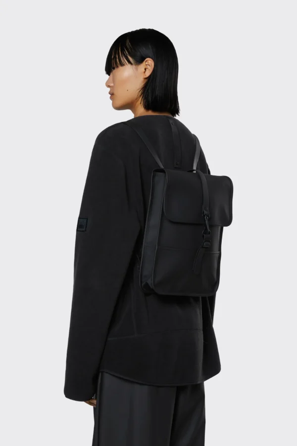 Rains Backpack Micro Black worn by model