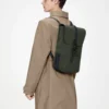 rains-backpack-mini-green (2) Rains Backpack Mini Green worn by model