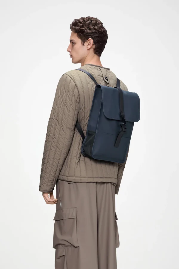 rains-backpack-mini-navy (2) Rains Backpack Mini Navy worn by model
