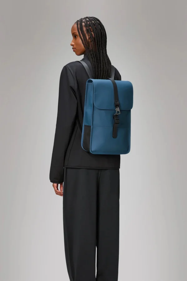 Rains Backpack Mini Pulse worn by model
