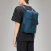 Rains Backpack Mini Pulse worn by model