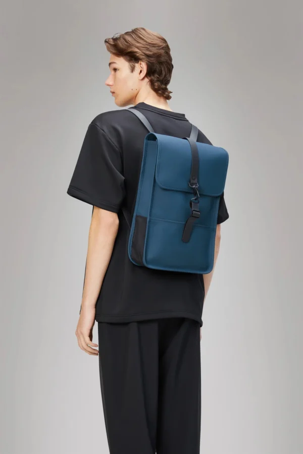 Rains Backpack Mini Pulse worn by model