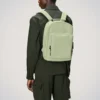rains-book-daypack-earth (3) Rains Book Daypack earth worn by model