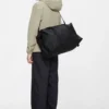 rains-hilo-weekend-bak-black (2) Rains Hilo Weekend Bag Black worn by model