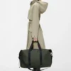 Rains Hilo Weekend Bag Green worn by model