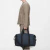 Rains Hilo Weekend Bag Navy worn by model