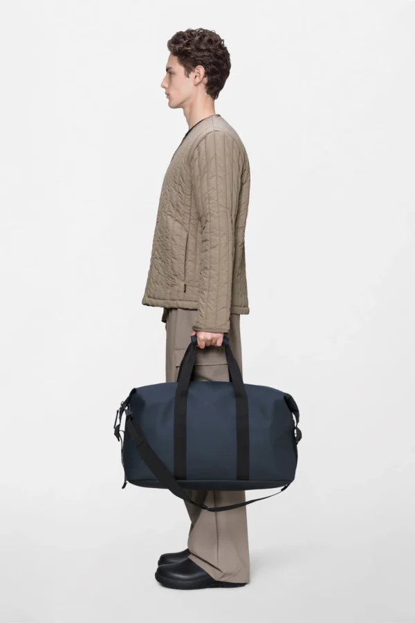 Rains Hilo Weekend Bag Navy worn by model