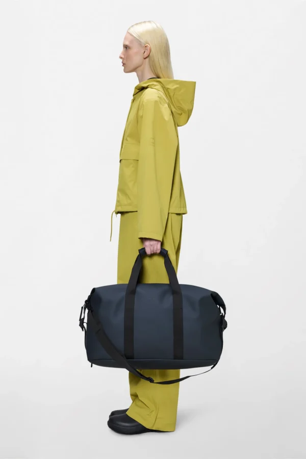 Rains Hilo Weekend Bag Navy worn by model