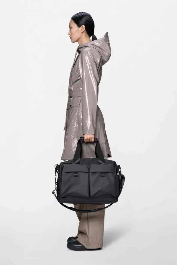 rains-otaru-weekend-travel-bag-small-black (5) Rains Otaru Weekend Bag Small black worn by model