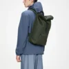 rains-rolltop-rucksack-green (2) Rains Rolltop Rucksack Green worn by model
