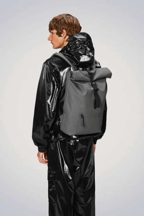 Rains Rolltop Rucksack Grey worn by model