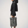 Rains Rolltop Rucksack Grey worn by model