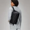 rains-texel-mountaineer-messenger-bag-black (1) Rains Texel Mounaineer Messenger Bag black worn by model