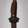 rains-texel-mountaineer-messenger-bag-black (2) Rains Texel Mounaineer Messenger Bag black worn by model