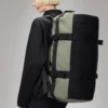 rains-texel-duffel-bag-drift (2) Rains Texel Duffel Bag Drift worn by model