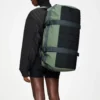 Rains Texel Duffel Bag Well worn by model