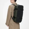 Rains Texel Duffel Bag Small Green worn by model